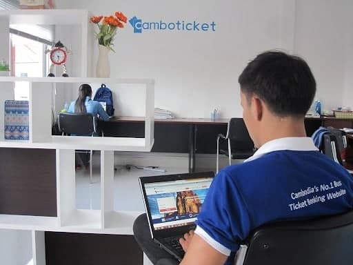 an employee of the camboticket team in their office.